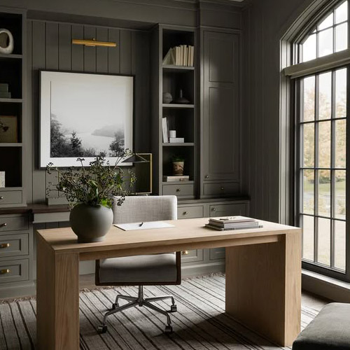 Dark, moody sophistication meets natural warmth, this home office blends rich hues, organic textures, and refined details for the perfect workspace.